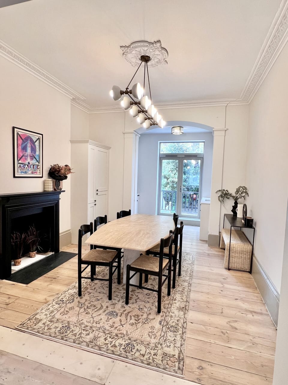 dining room and kitchen with doors to garden