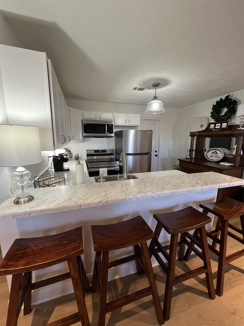 4 barstools and counter to enjoy your meals and visit