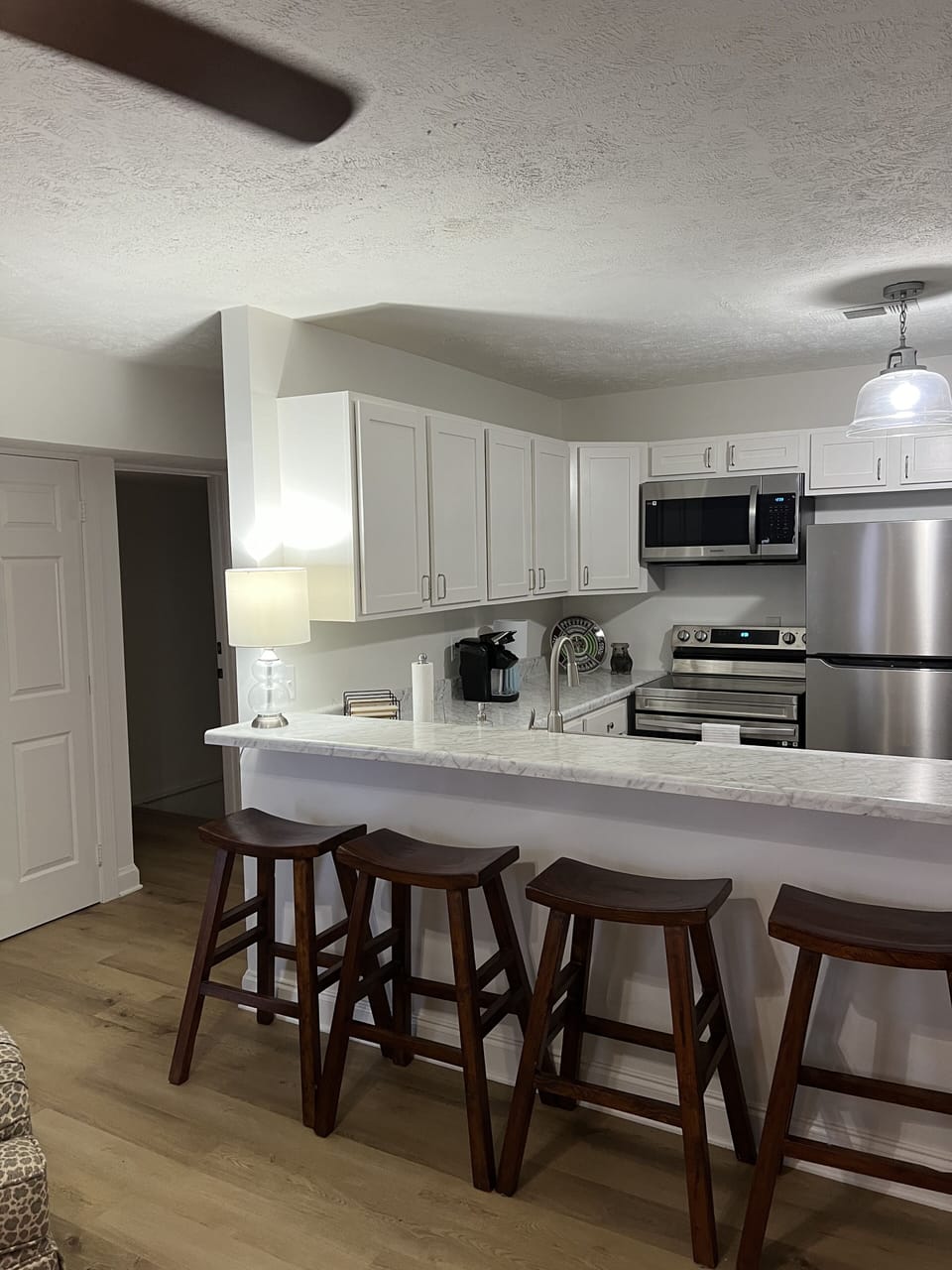 Kitchen is open to den area