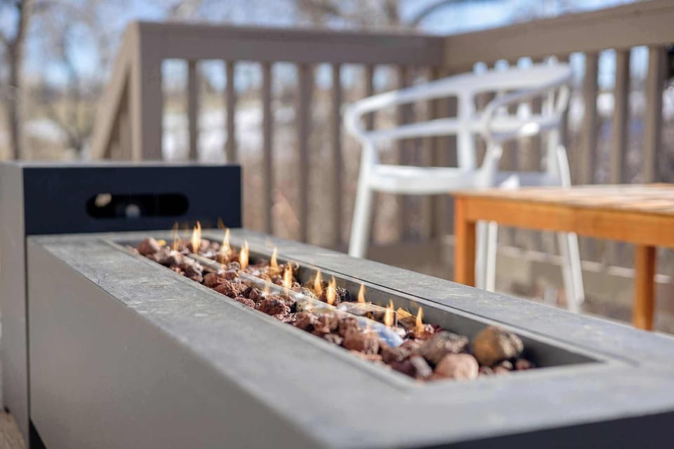 Turn on the gas firepit and enjoy time around the fire.