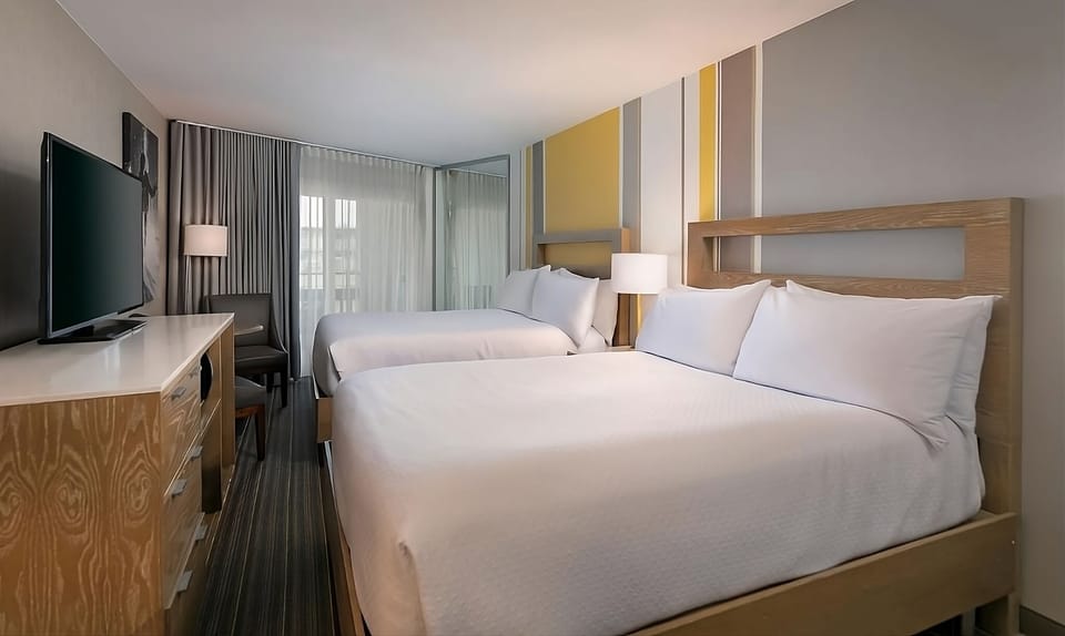 Stretch out on two plush beds after a day exploring.