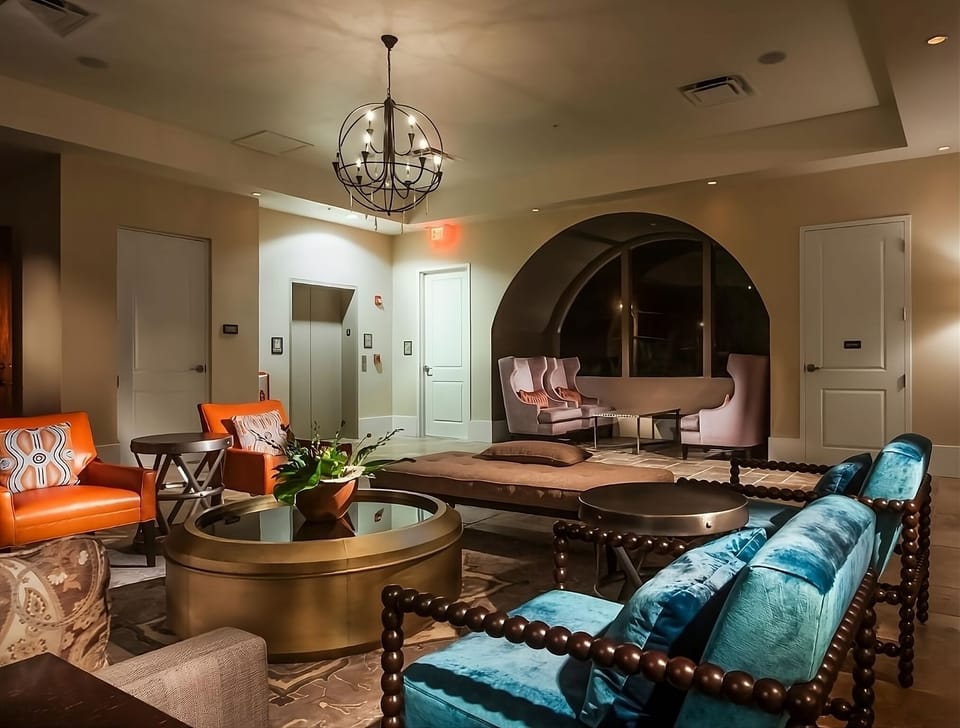 Unwind in the chic lounge with plush, conversation-ready seating.
