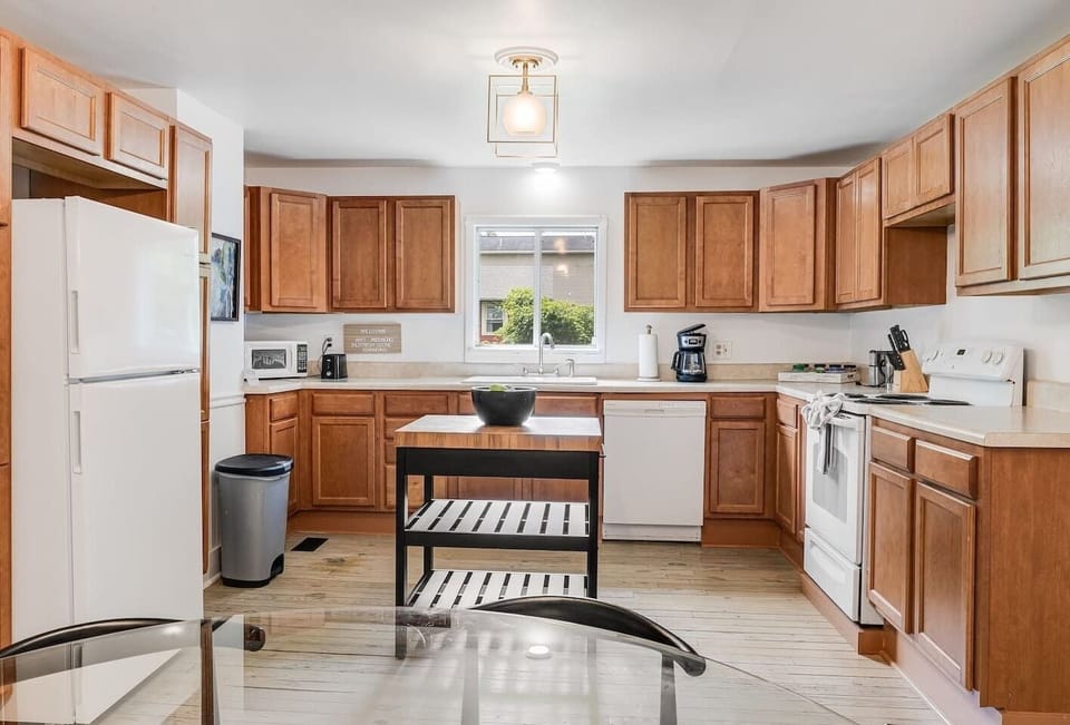 Wide view of the kitchen from the dining table