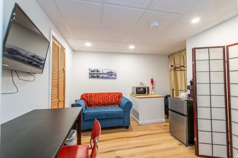 This private apartment features a cozy work nook or dining area and a television that is equipped with a roku so you can easily access all your favorite streaming content and accounts