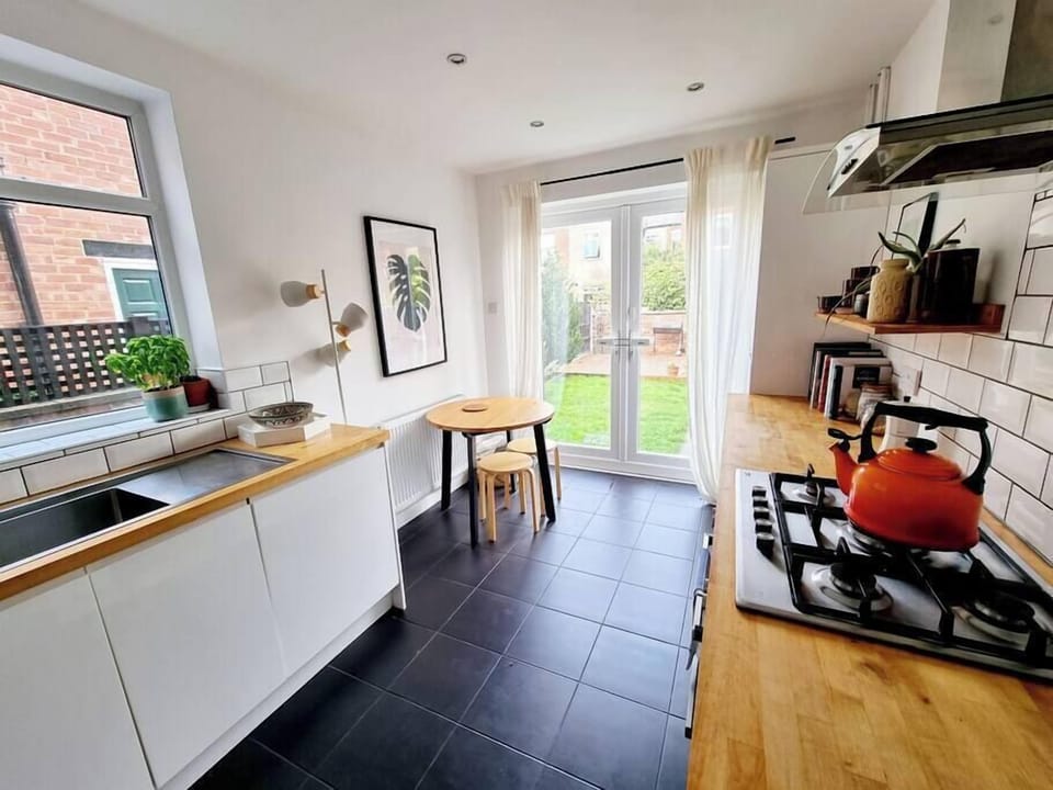 Put the kettle on and unwind with a cuppa in this bright, welcoming kitchen