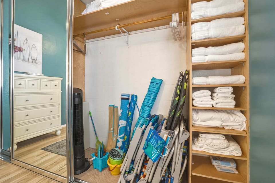 Enjoy full access to essential vacation gear, including beach chairs, mats, umbrellas, sand toys, and crisp linens stored for your stay.