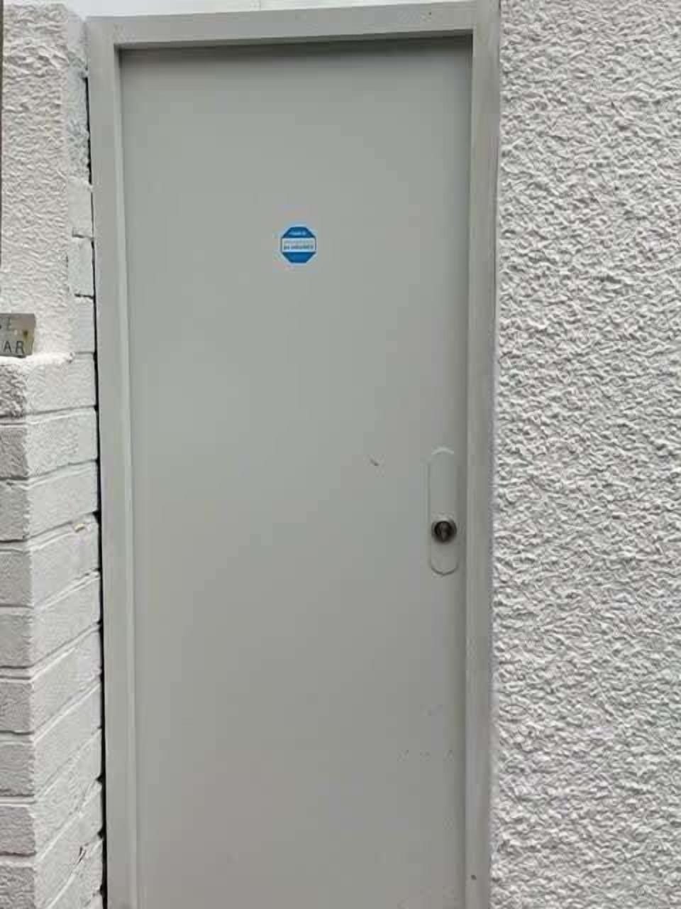 Side entrance to garden another steel door 