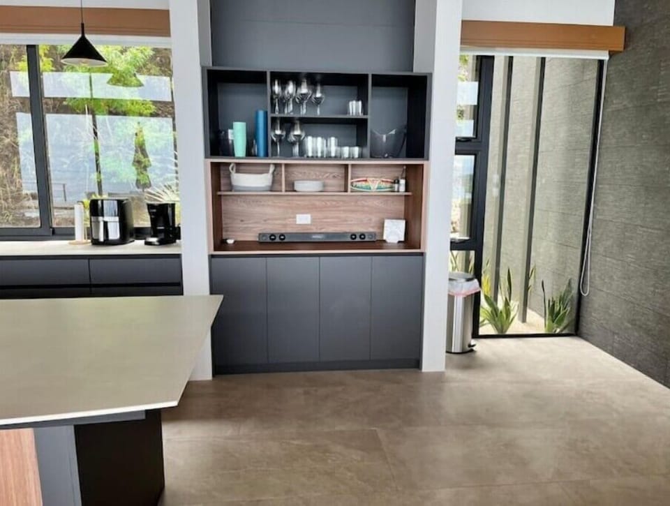 Glassware and additional storage in the kitchen