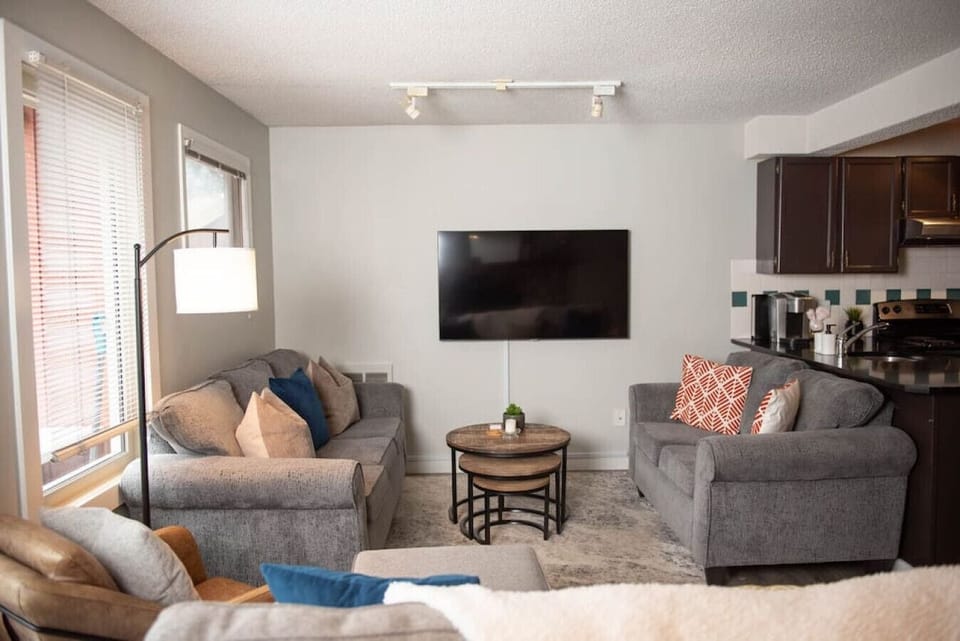 The living room has a TV perfect for watching a movie with the whole family.