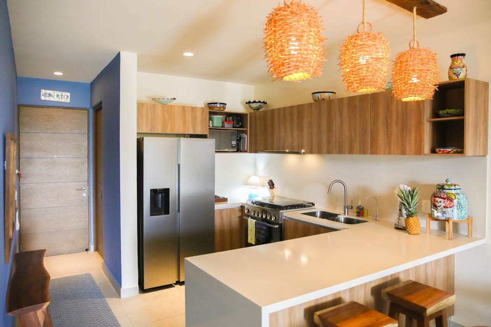 Fully stocked kitchen with dishwasher, microwave, and stove + oven for easy meal prep.