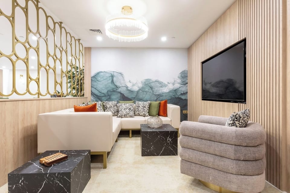  Shared Office Workspace: A common area used by multiple residents for work