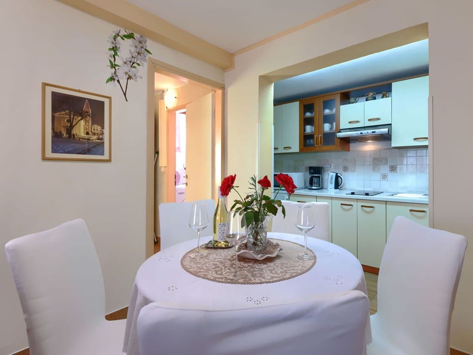 Furniture, Flower, Property, Table, Plant, Lighting, Interior Design, Architecture, Cabinetry, Chair