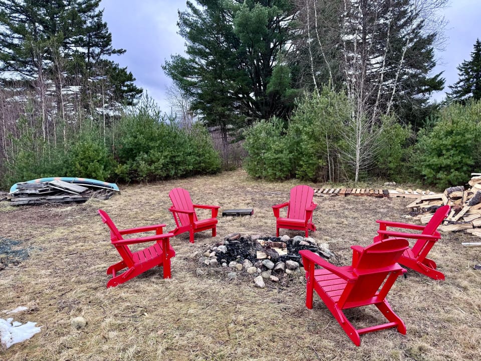 Roasting marshmallows by the fire pit - this home is designed for comfort and fun.