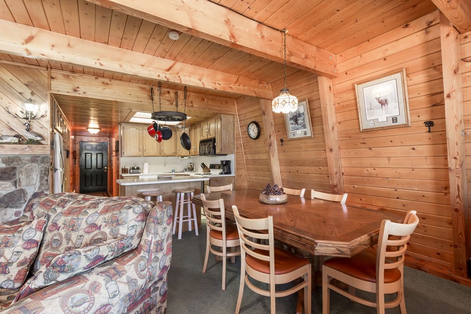 Dining Room seats 6 at the table and 2 at the bar. There is a lot of table space also out on the covered deck.