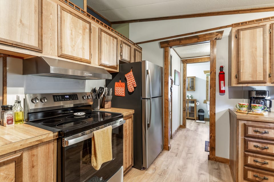 Enjoy the convenience of a brand new full-size refrigerator, range, and microwave. Whether you're preparing a quick breakfast before heading out or cooking a relaxed dinner in, you'll have everything you need right at your fingertips