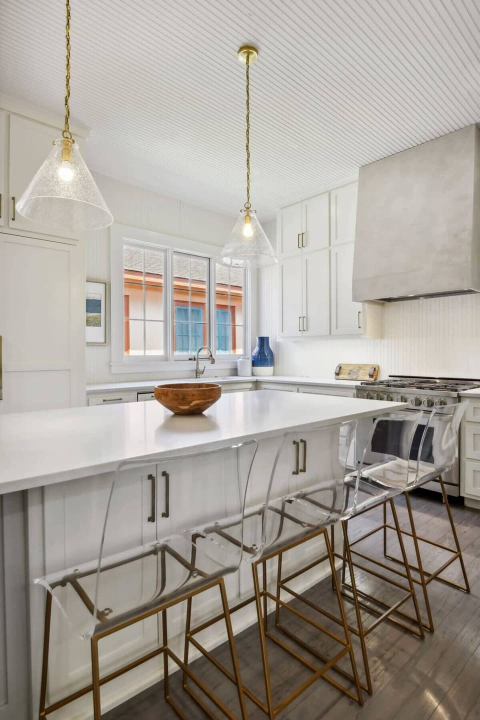 Chef's kitchen with stainless steel appliances and bar seating