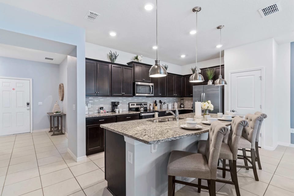 his fully equipped kitchen is a chef's dream, boasting modern appliances and ample space for culinary creations, where every meal becomes a masterpiece and every moment a delight.