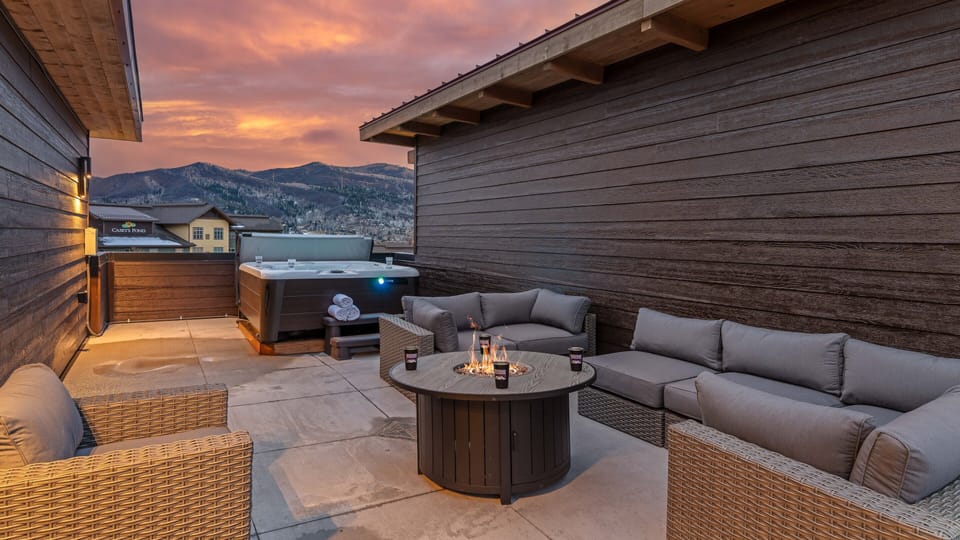 Patio, Rooftop Level - With gas fireplace, comfortable seating, and hot tub