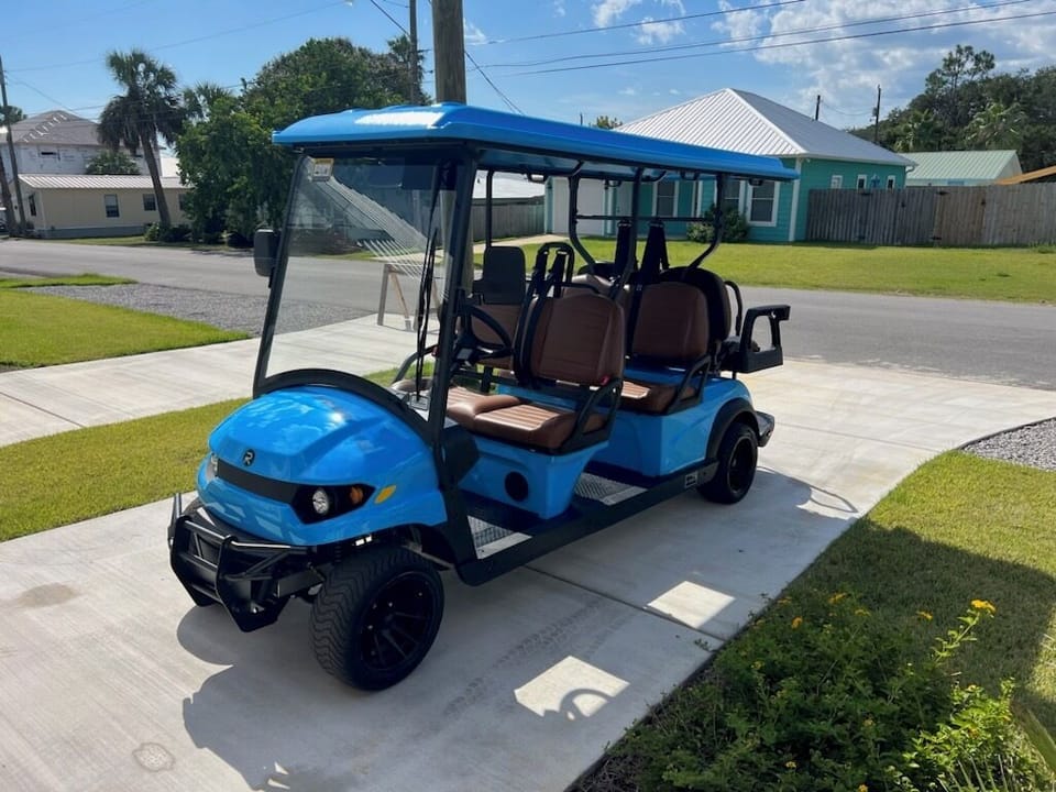 INCLUDED golf cart through 2025 rental season!