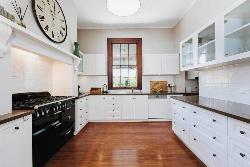 A generously sized gourmet kitchen combines old-world with contemporary charm. It comes equipped with everything you’ll need to cook up a feast.
