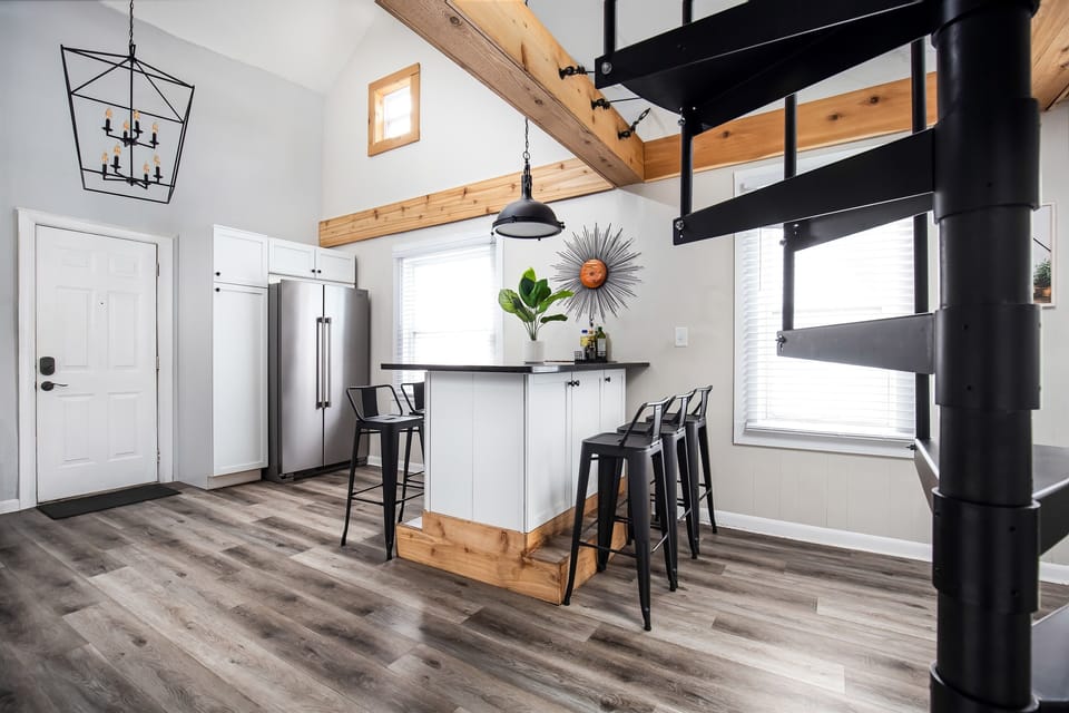 Kitchen with stairs to the loft