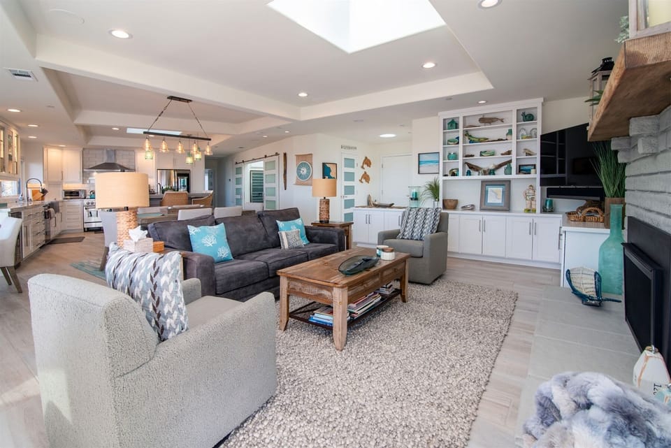Plenty of seating options in the living room plus large Smart TV