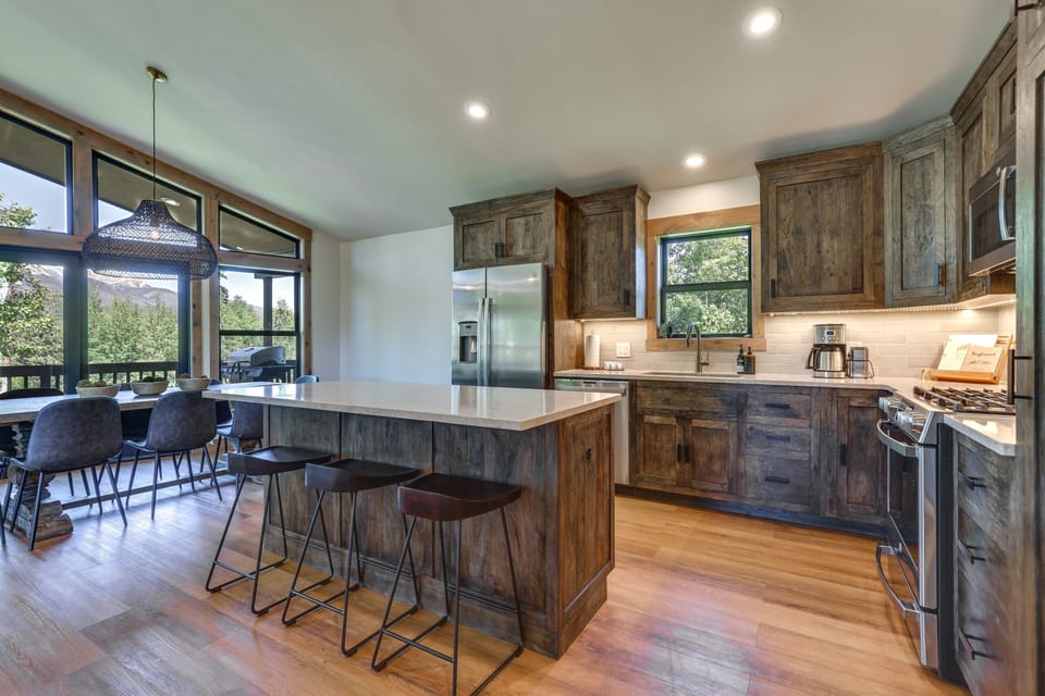 Good sized kitchen with new appliances and 3 extra seats at the island.