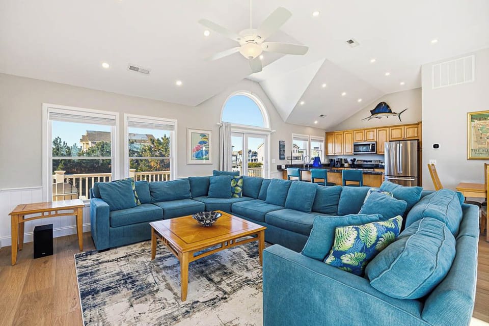 Top-Level Living Room with Deck Access