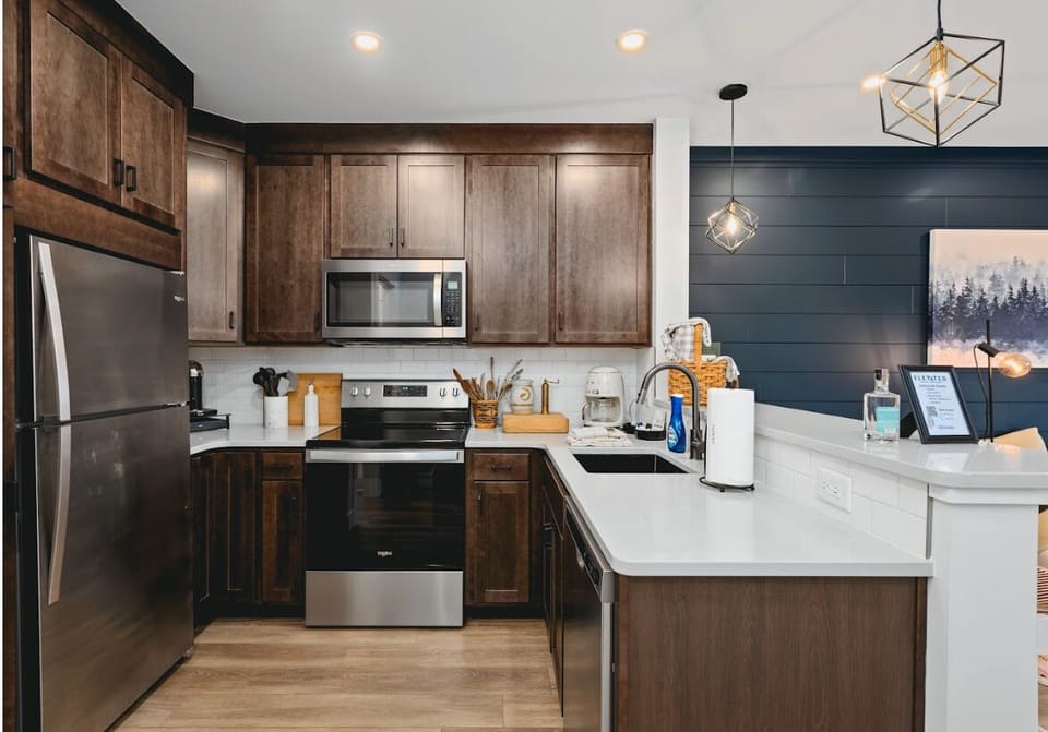 Well-equipped kitchen w/ sleek counters & modern appliances to make every meal easy.