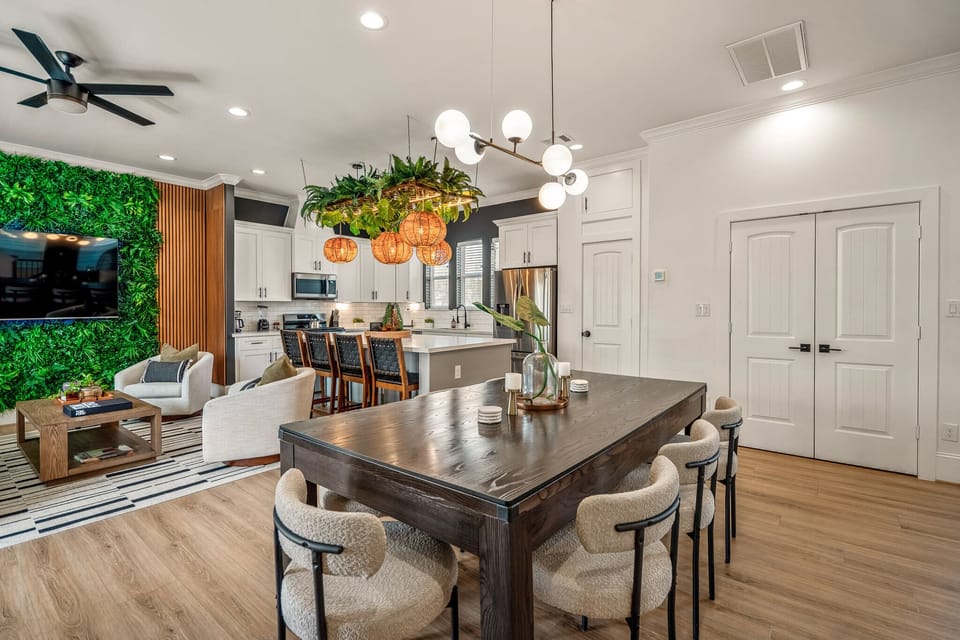Where modern design meets boho-chic! Our classic dining table seats 8 guests with an additional 4 counter stools at our kitchen island. If needed, an additional two chairs are located in the room for larger groups.