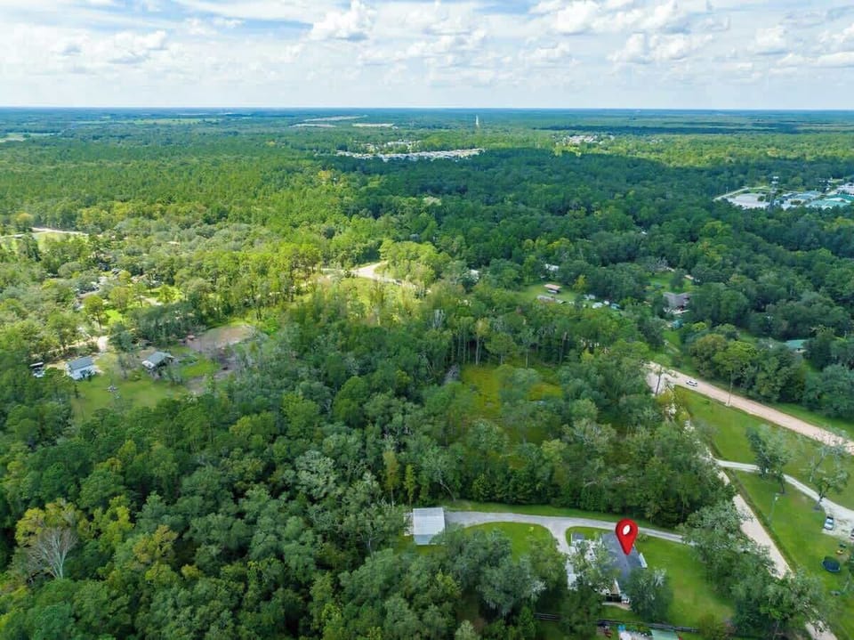Beautiful country surrounded by trees, yet not far from city living. The nearest grocery store is only 0.8 miles away. 