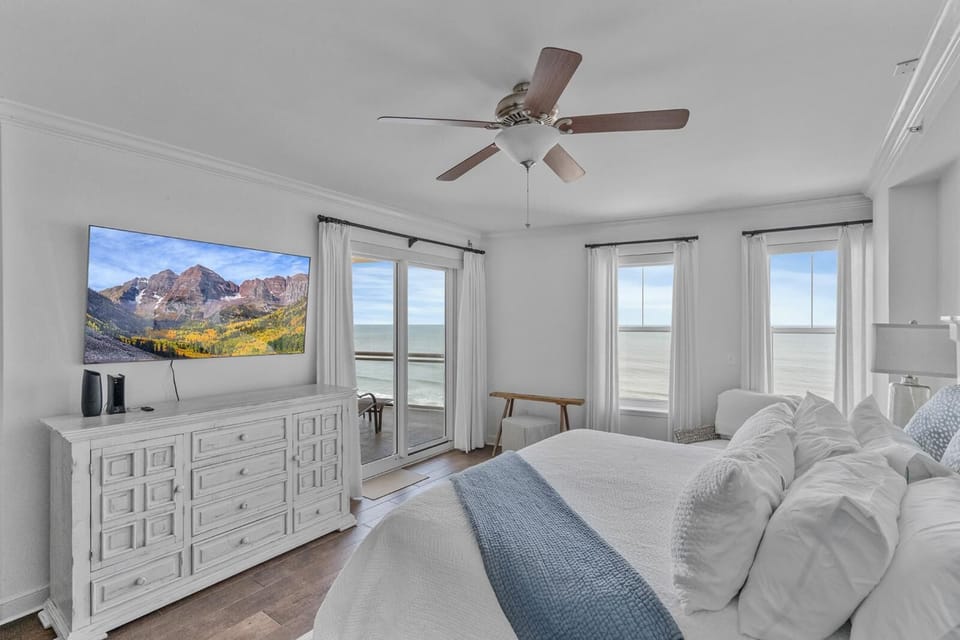 Bright and airy bedroom with stunning mountain views