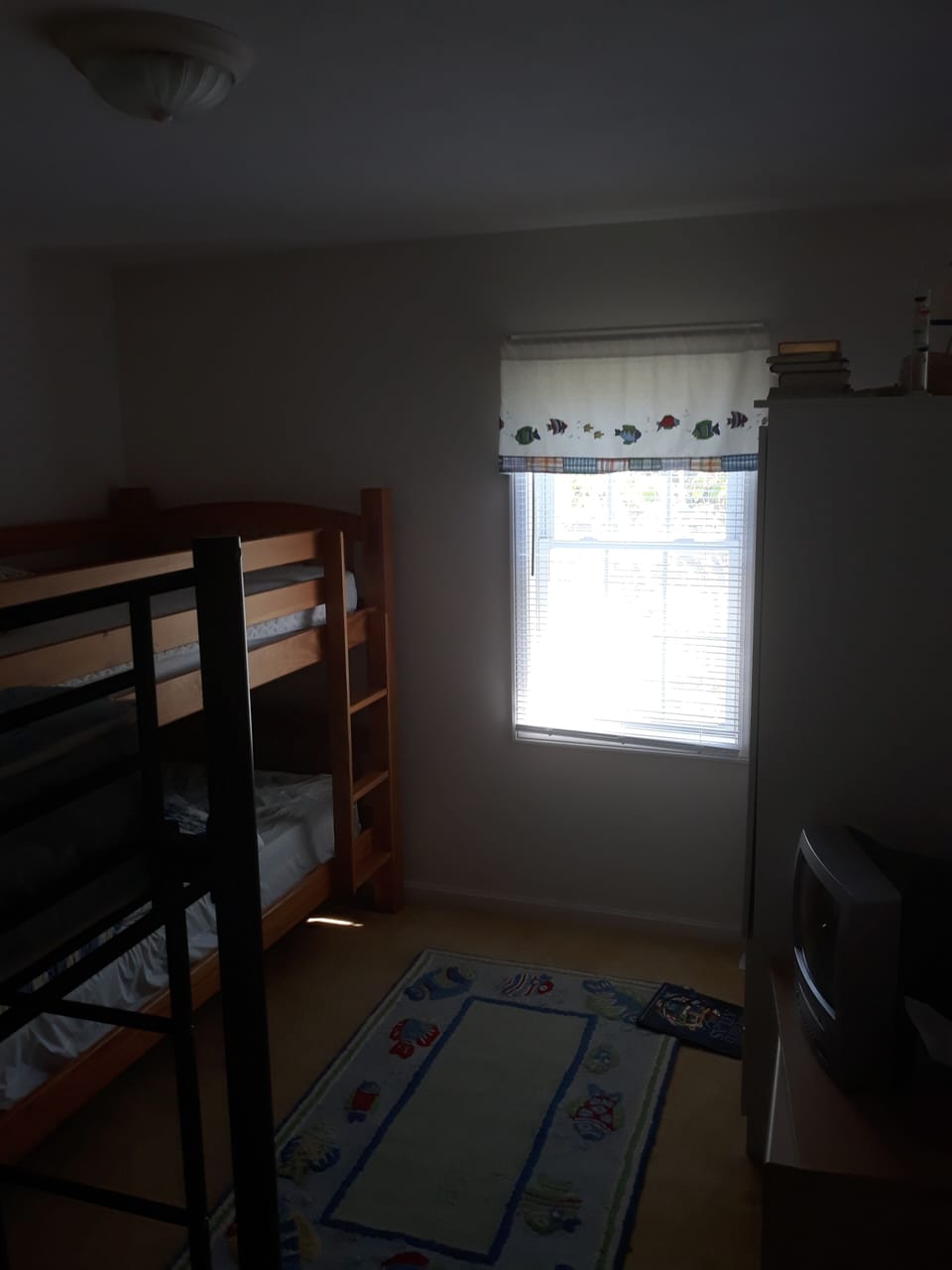 The bunk room, featuring two bunk beds (4 beds total). Dark photo - really!