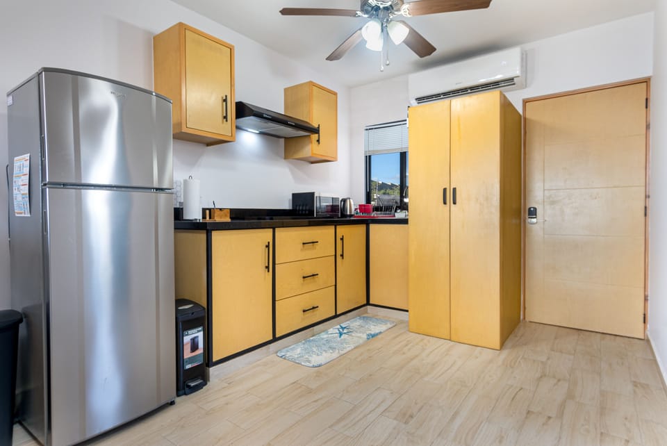 Full Kitchen w/ fridge, w/d, stove, microwave, coffeemaker and air fryer