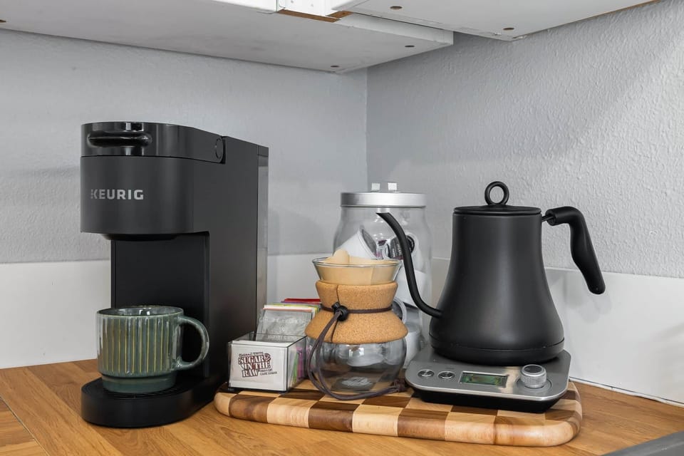Our coffee and tea station, complete with Keurig, Chemex, French press & electric drip coffee makers