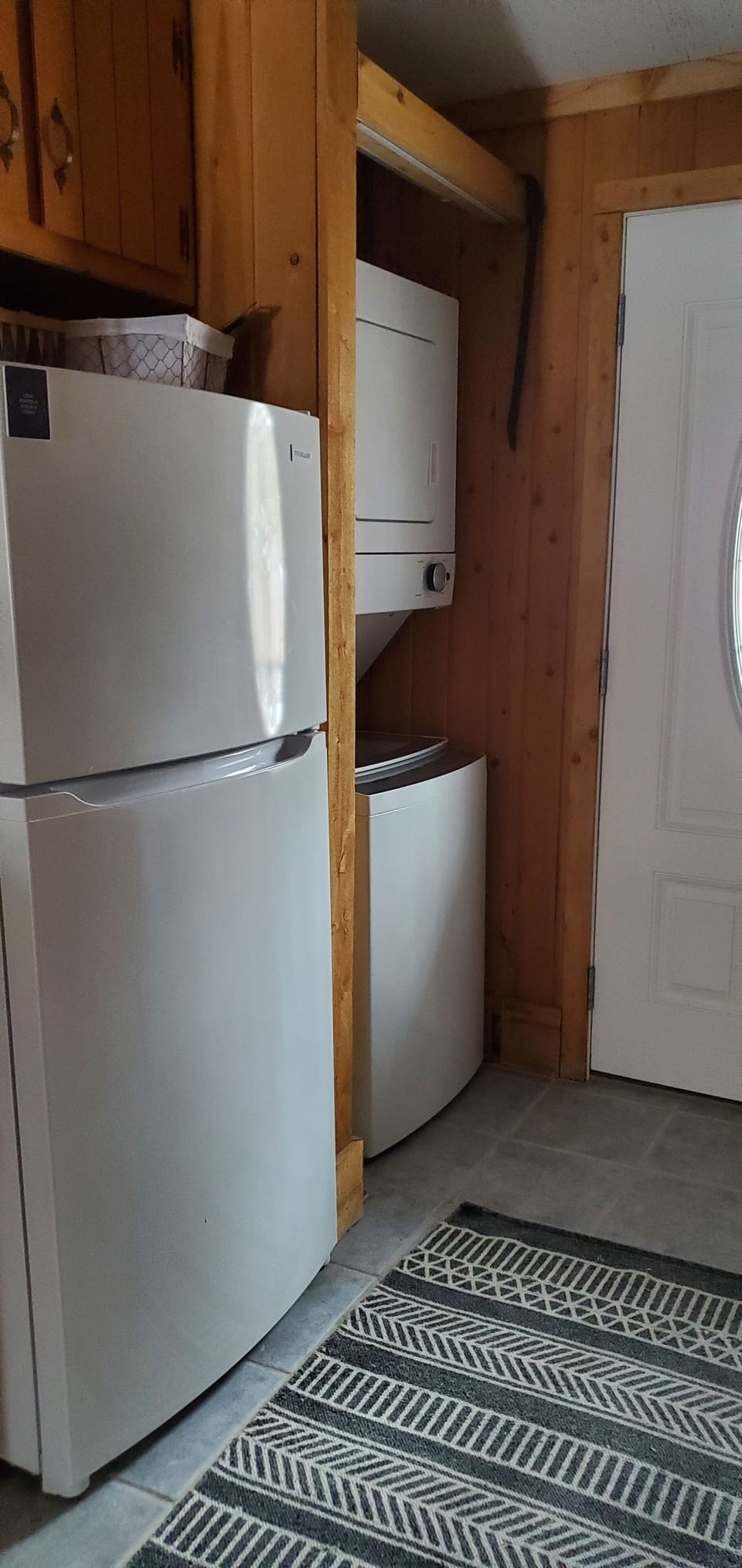 A full sized refrigerator & washer/dryer.