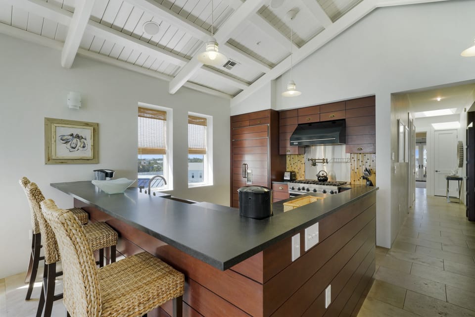 MODERN KITCHEN W/ BAR TOP SEATING FOR THREE