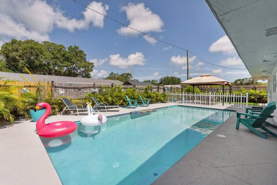 As the day unfolds, the pool area transforms into a serene haven, perfect for evening relaxation.