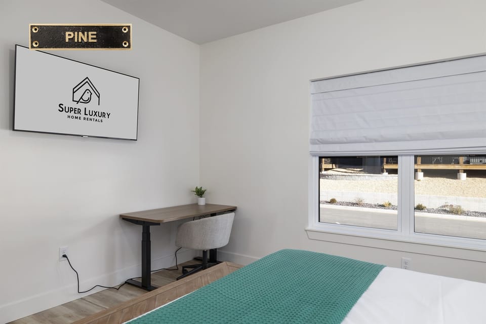 Tree House - Main Level: Bedroom 1 "Pine" w/ King Bed and ensuite bathroom