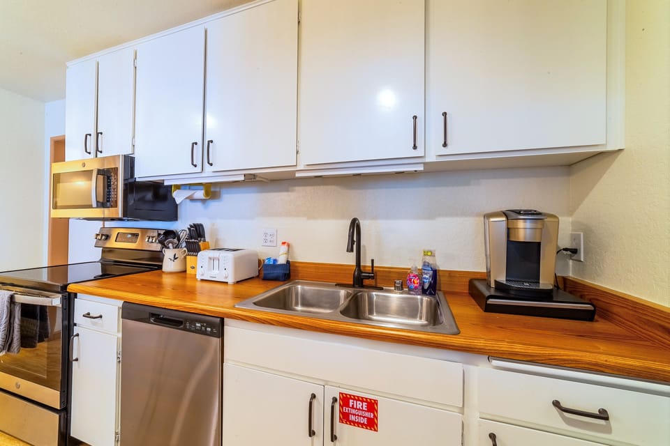 Kitchen comes fully stocked with everything needed to cook a delicious meal.