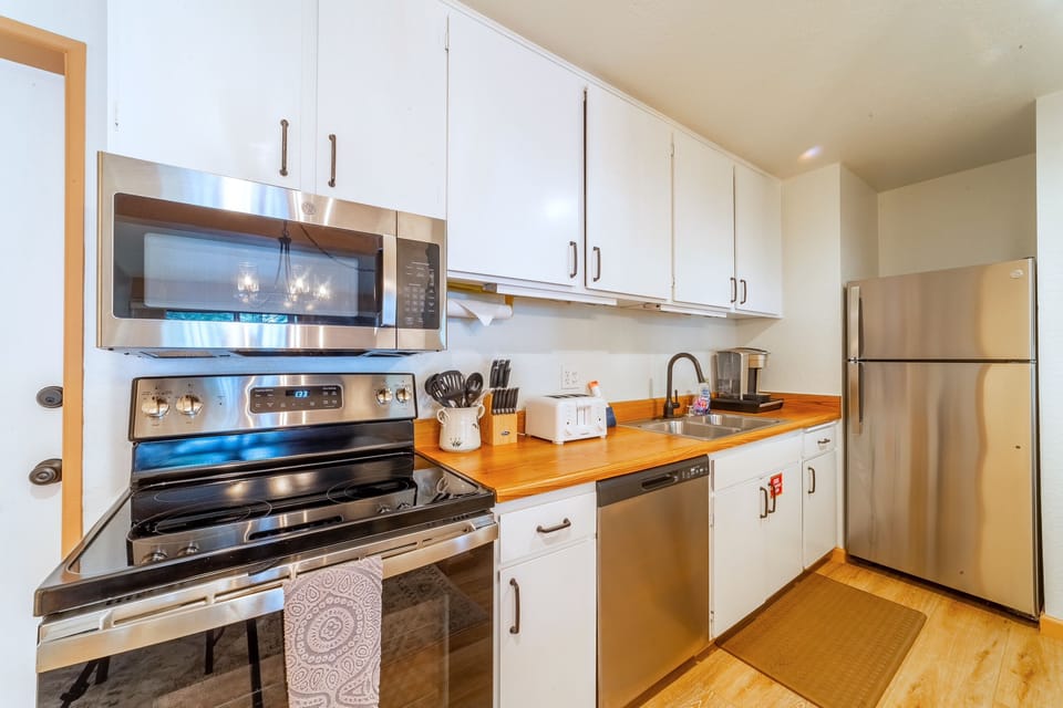 Nice sized galley kitchen with upgraded stainless steel appliances.