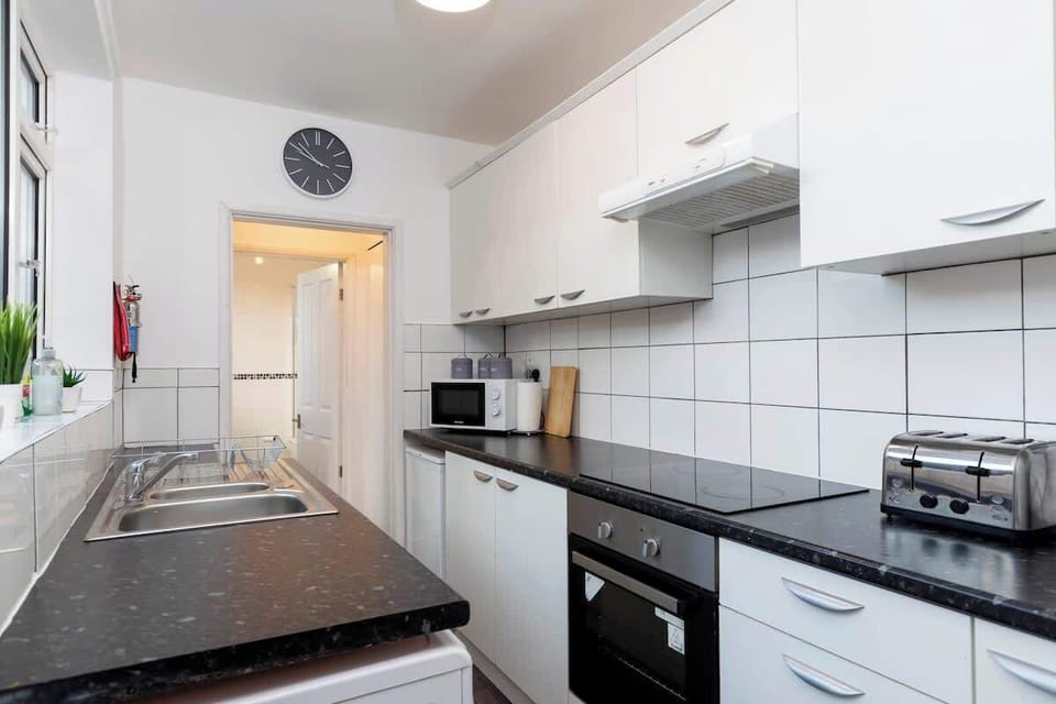 Whip up meals with ease in the fully equipped kitchen—stocked with all the essentials to make you feel right at home.
