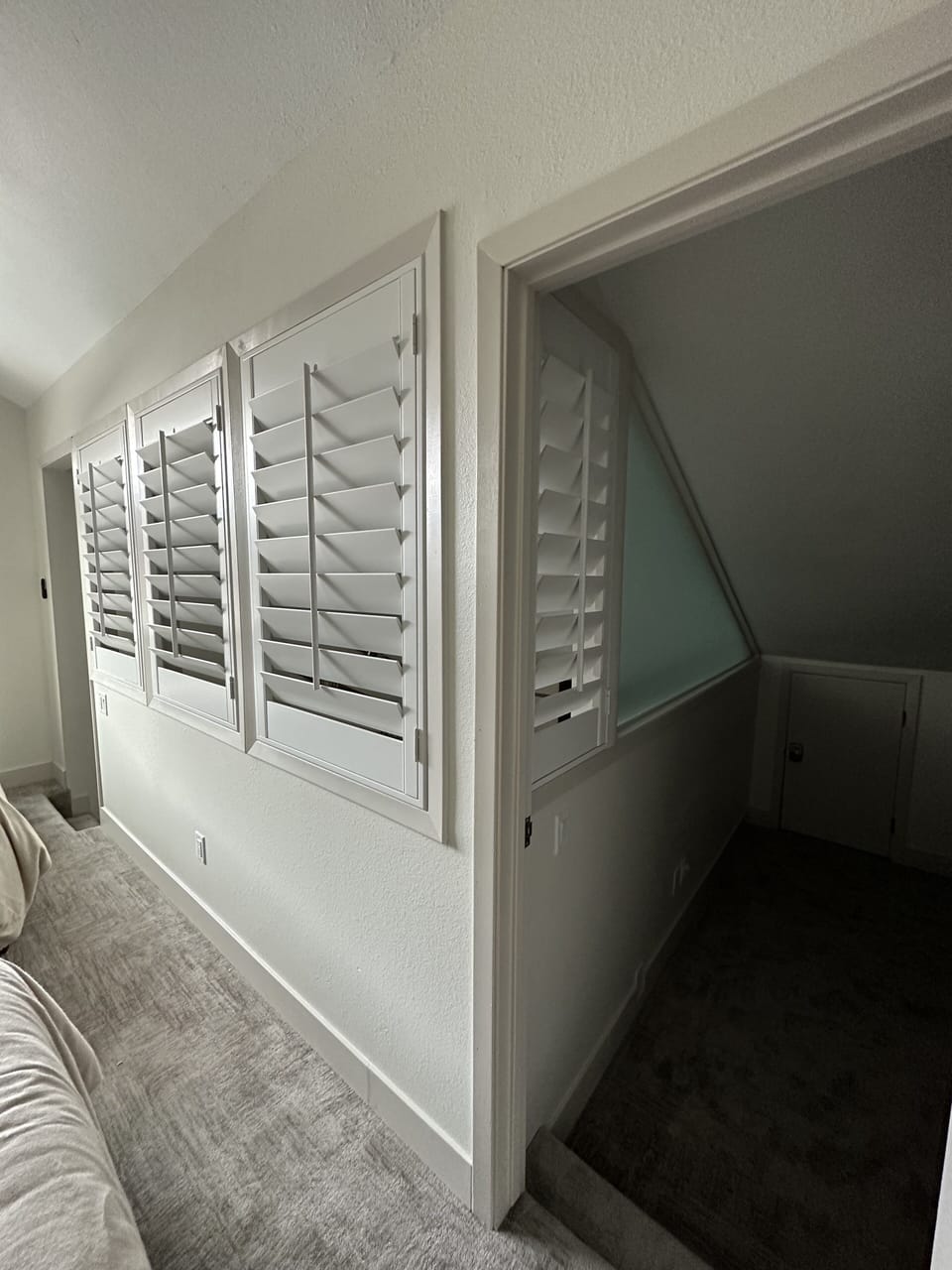Shutters offer privacy for upstairs loft areas