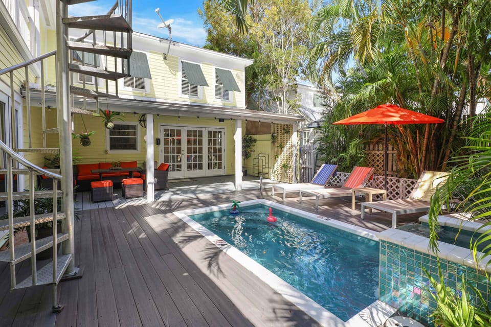 Backyard and pool. View from back entrance.
