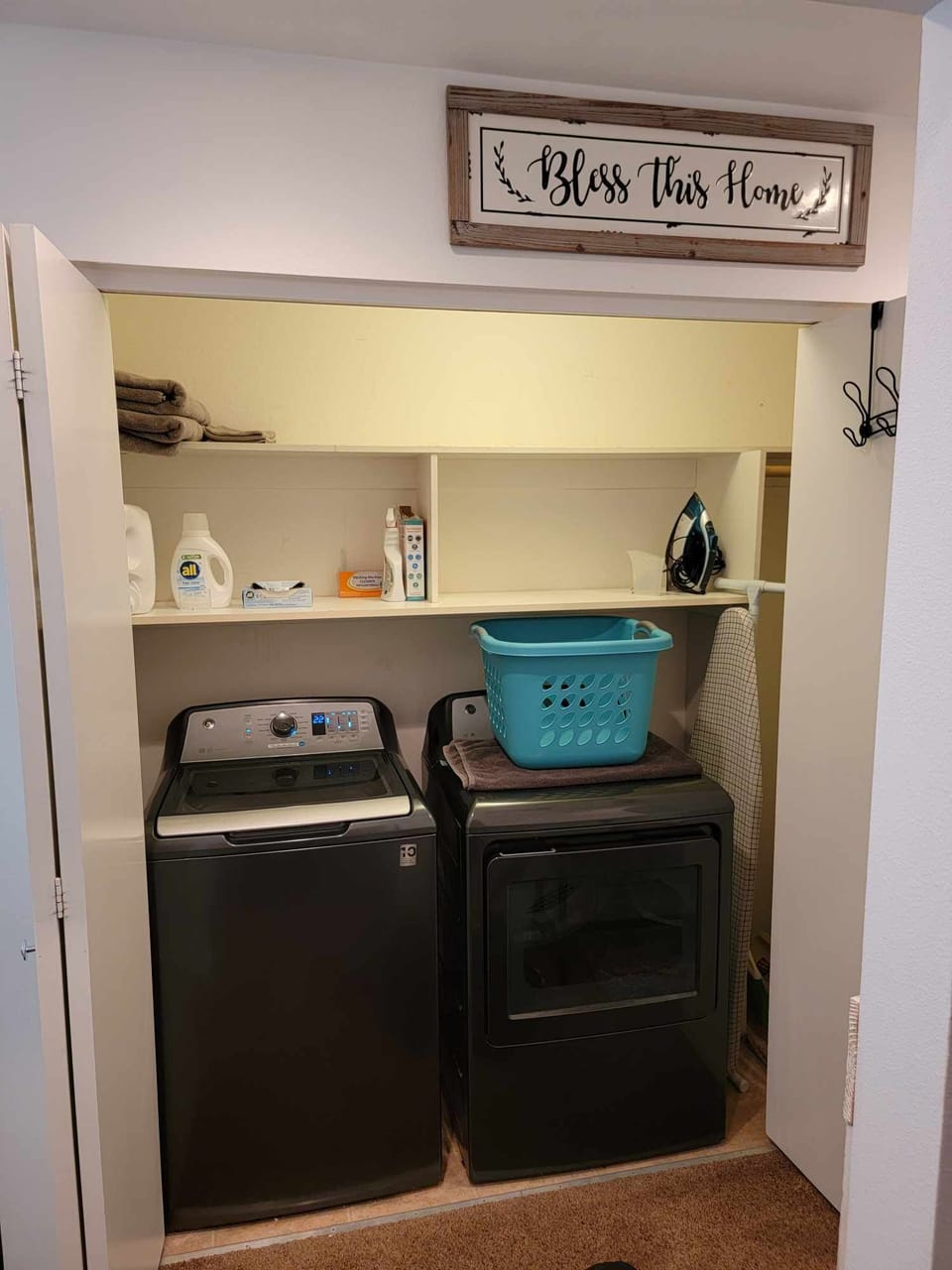 Washer and dryer located in the unit