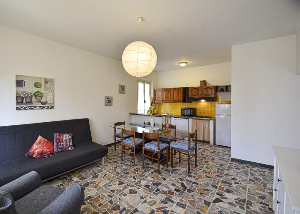 Living room with table-Ginestra 1-Elba Island