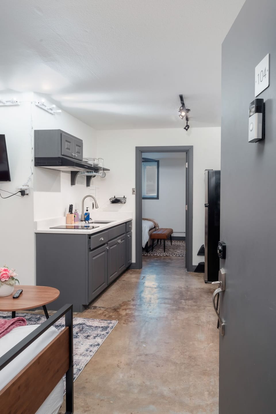 Experience the perfect fusion of comfort and functionality in our cozy space, seamlessly integrating living, sleeping, kitchen and dining areas for a well-rounded stay.