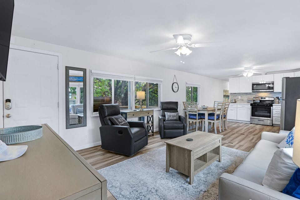 The dining space is behind the living room