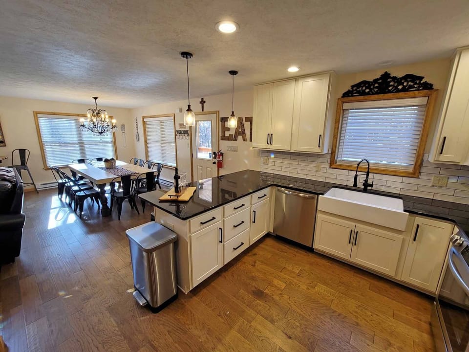 The kitchen overlooks the living and dining room areas. 
