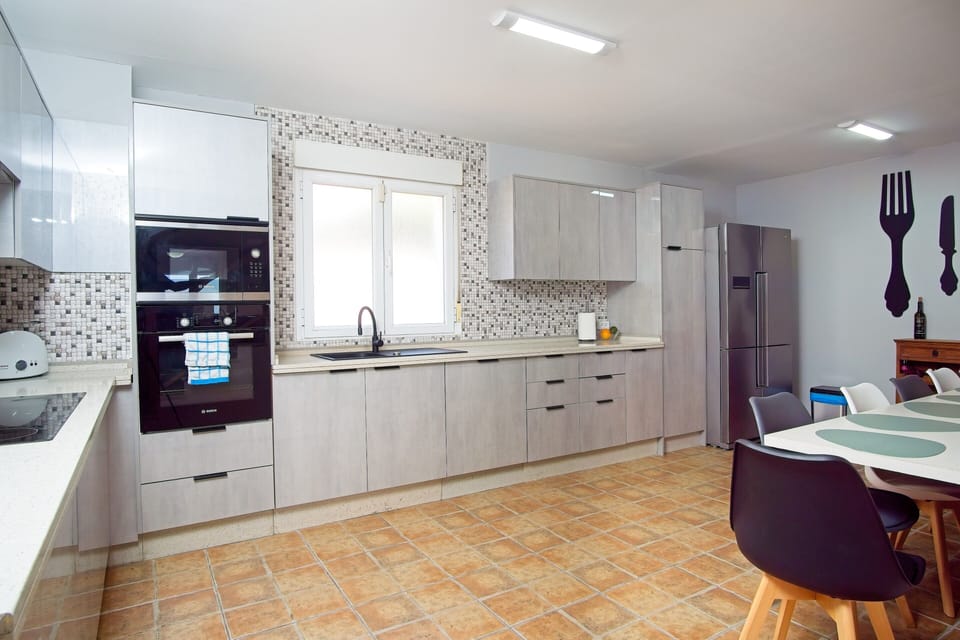 Spacious kitchen also has dining area